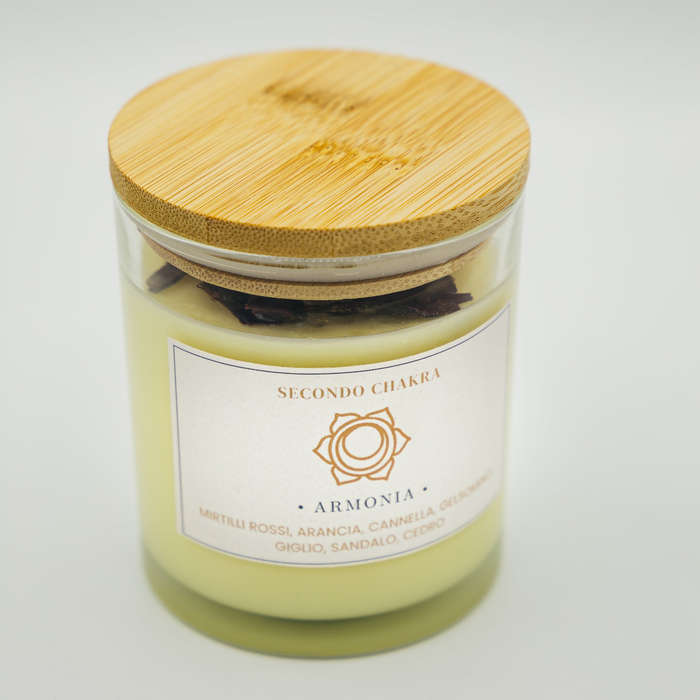 Candela armonia secondo chakra in vaso di vetro con coperchio in bambù e decorazioni di legno