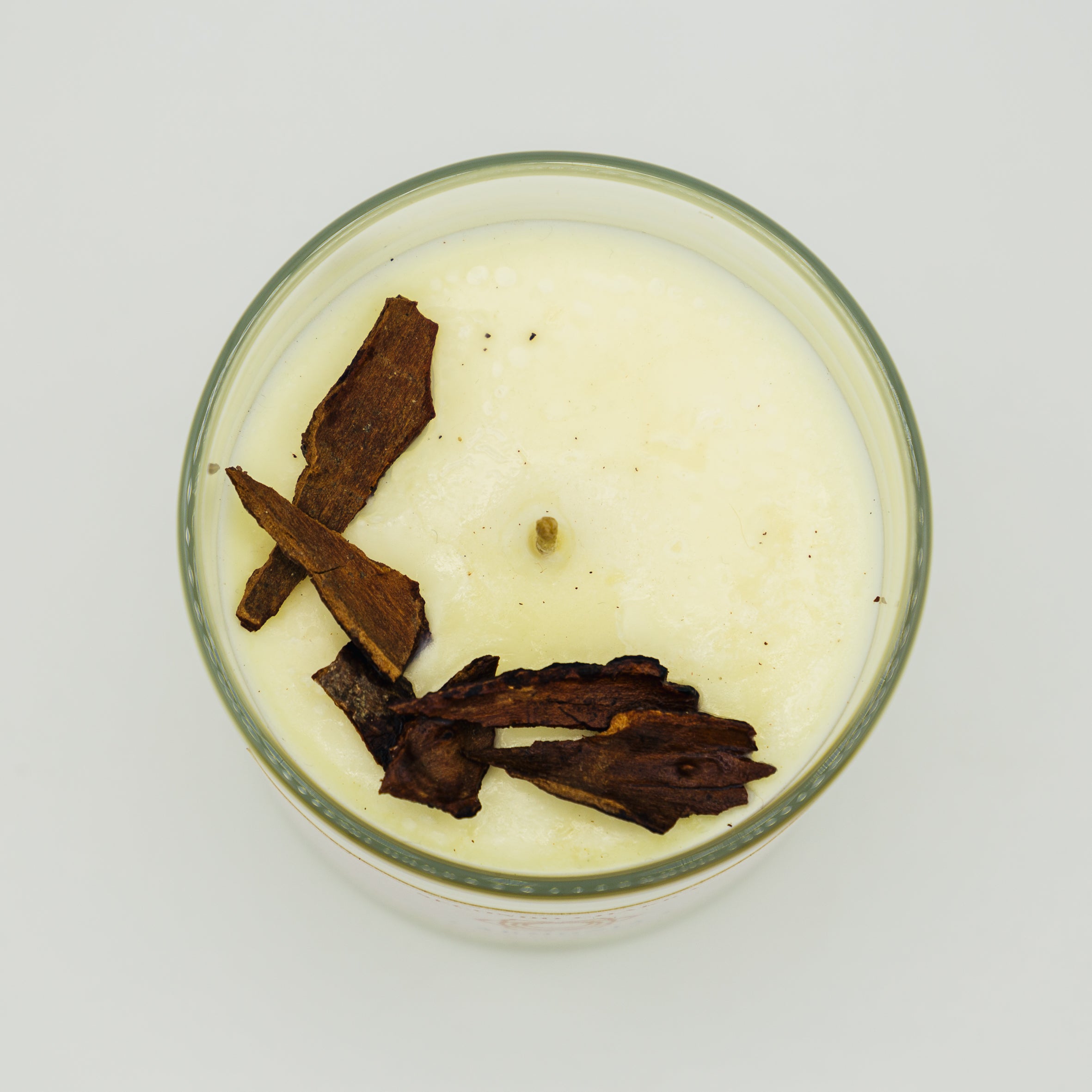 Candela armonia secondo chakra con pezzi di legno per un&