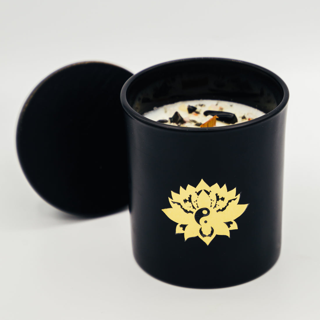 Candela con cristalli in contenitore nero con design di loto per aromaterapia e meditazione