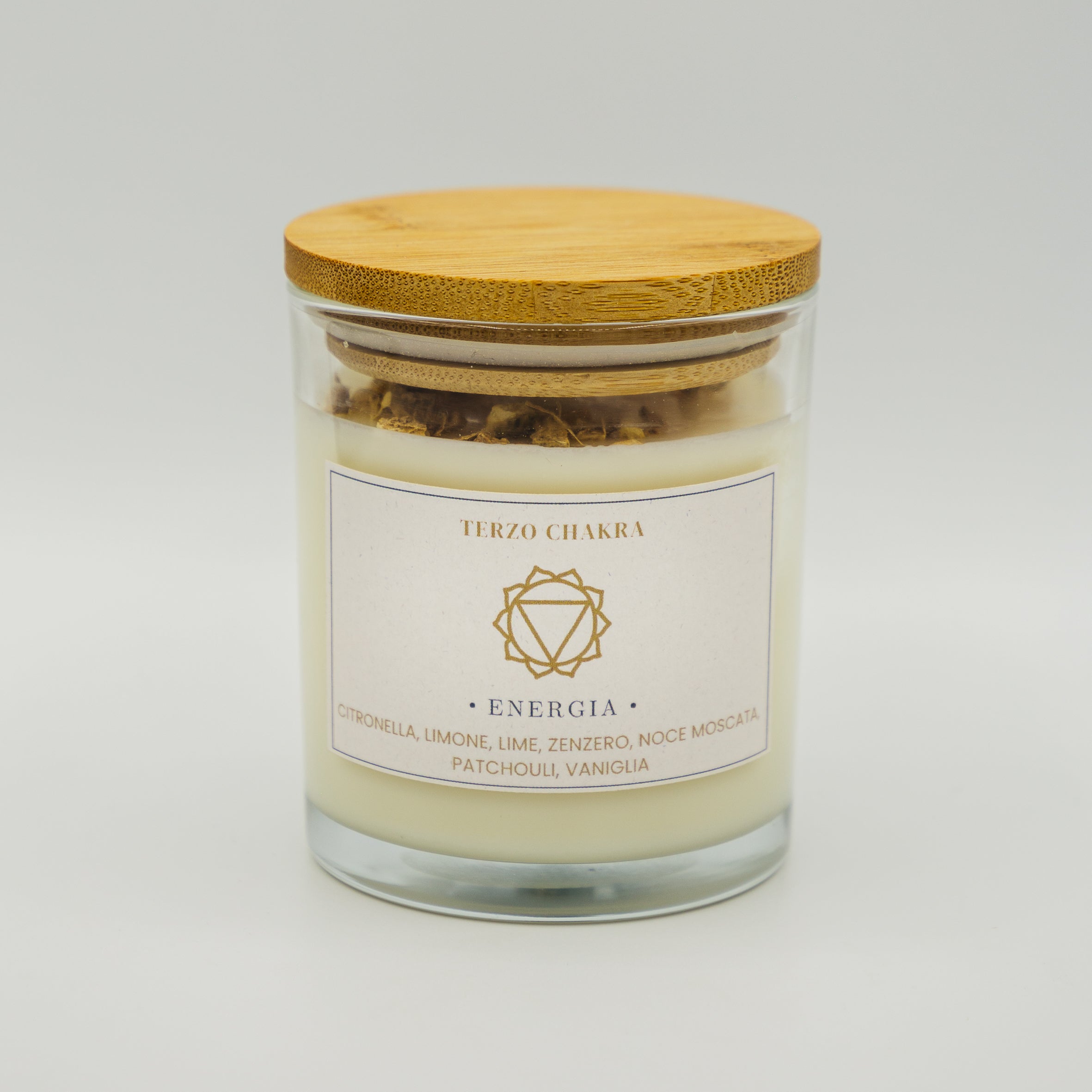 Candela energia terzo chakra in vetro con coperchio in legno, aromi di citronella e patchouli