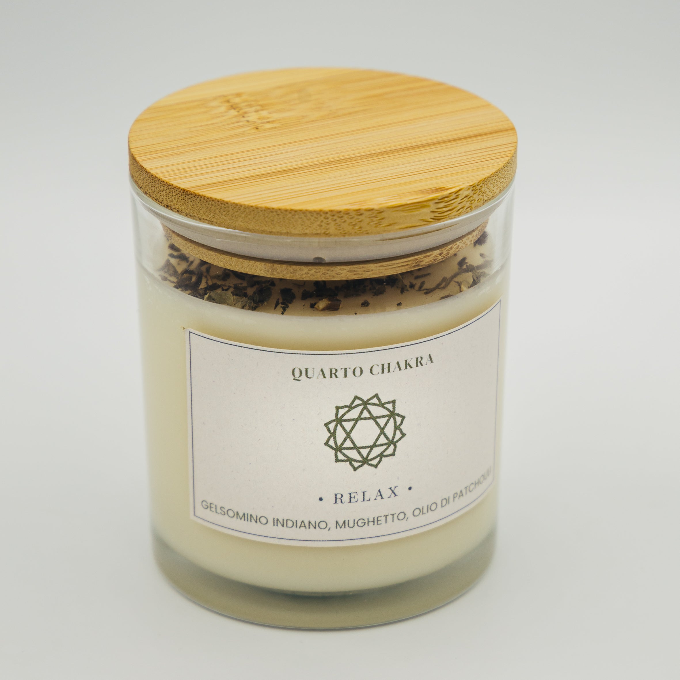 Candela relax quarto chakra in vetro con coperchio in bambù e aromi di gelsomino e mughetto