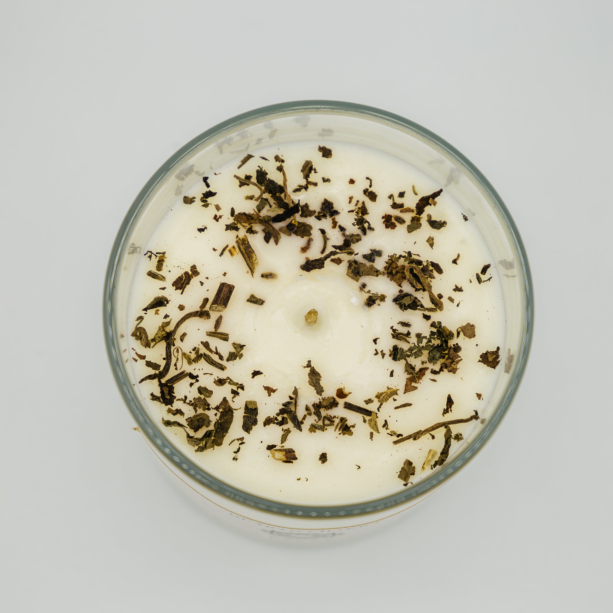 Candela relax quarto chakra con erbe naturali per creare un&