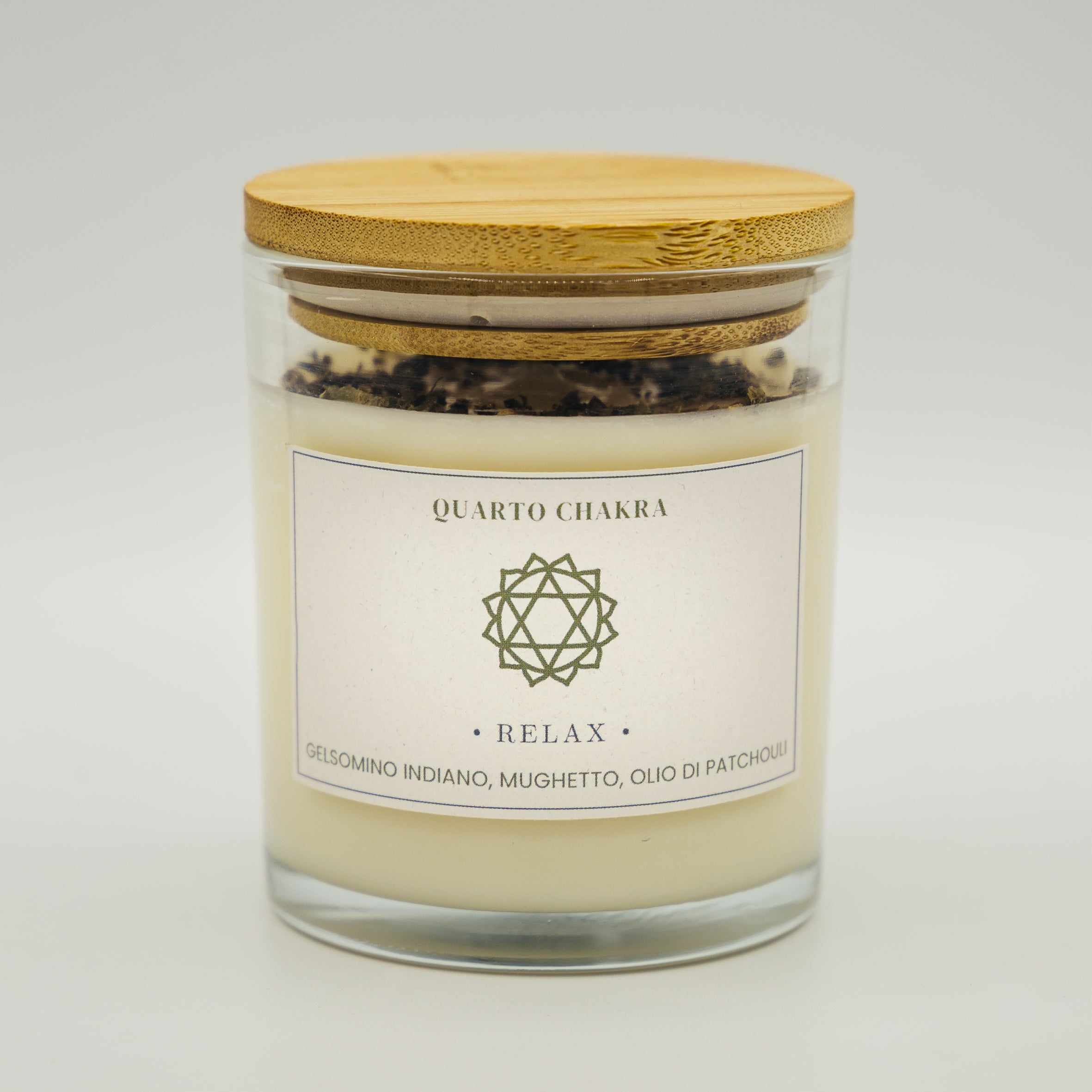 Candela relax quarto chakra con gelsomino, mughetto e olio di patchouli in vaso di vetro