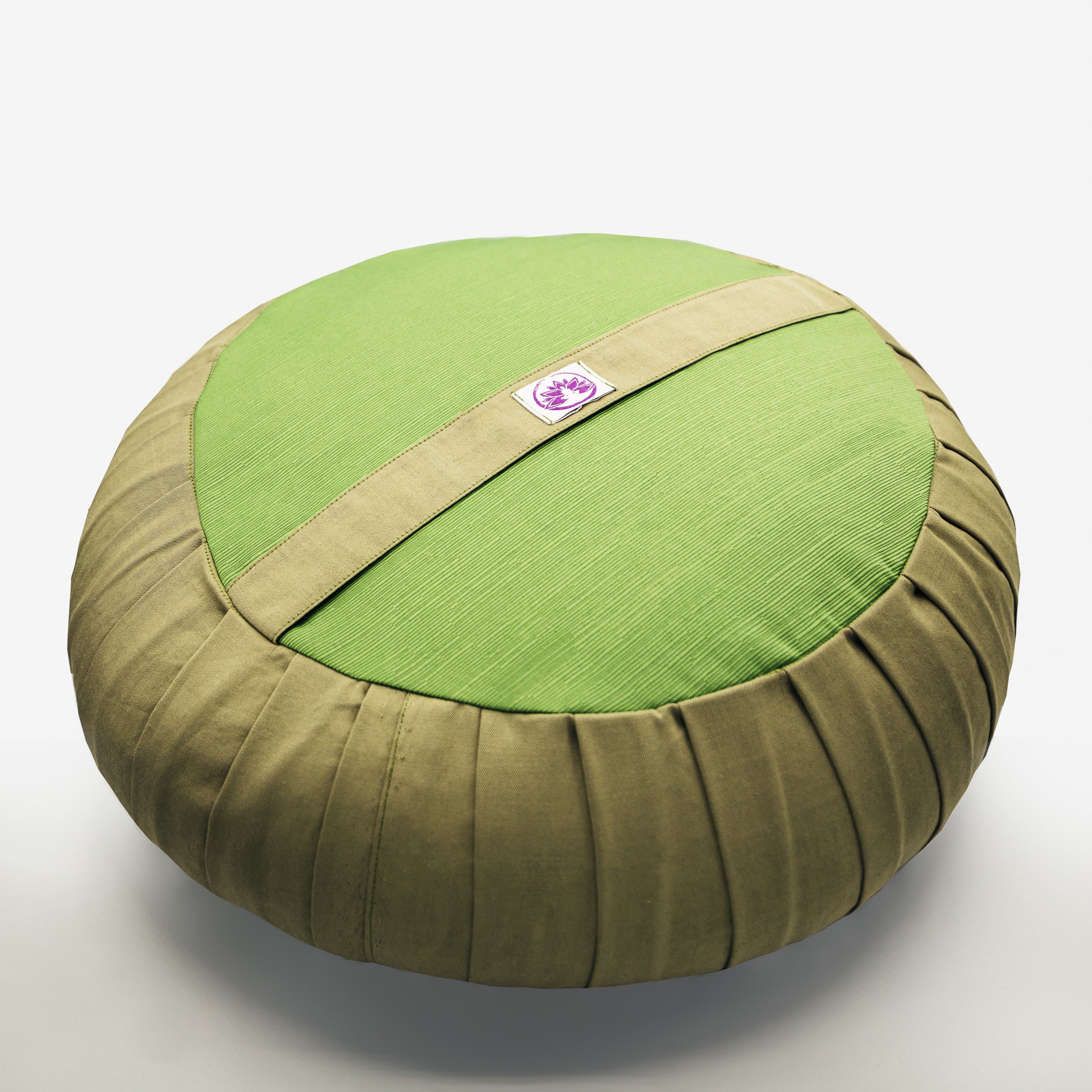 Cuscino zafu classico verde in cotone con una forma rotonda e design accogliente per il supporto lombare