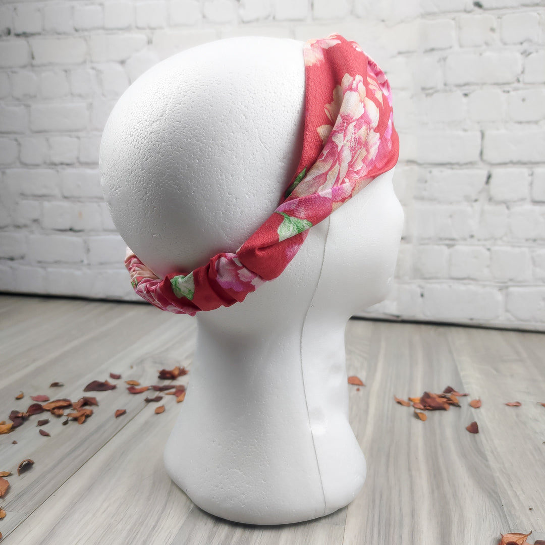 Fascia capelli elastica floreale in rosa con design a fiori per un look elegante e fresco