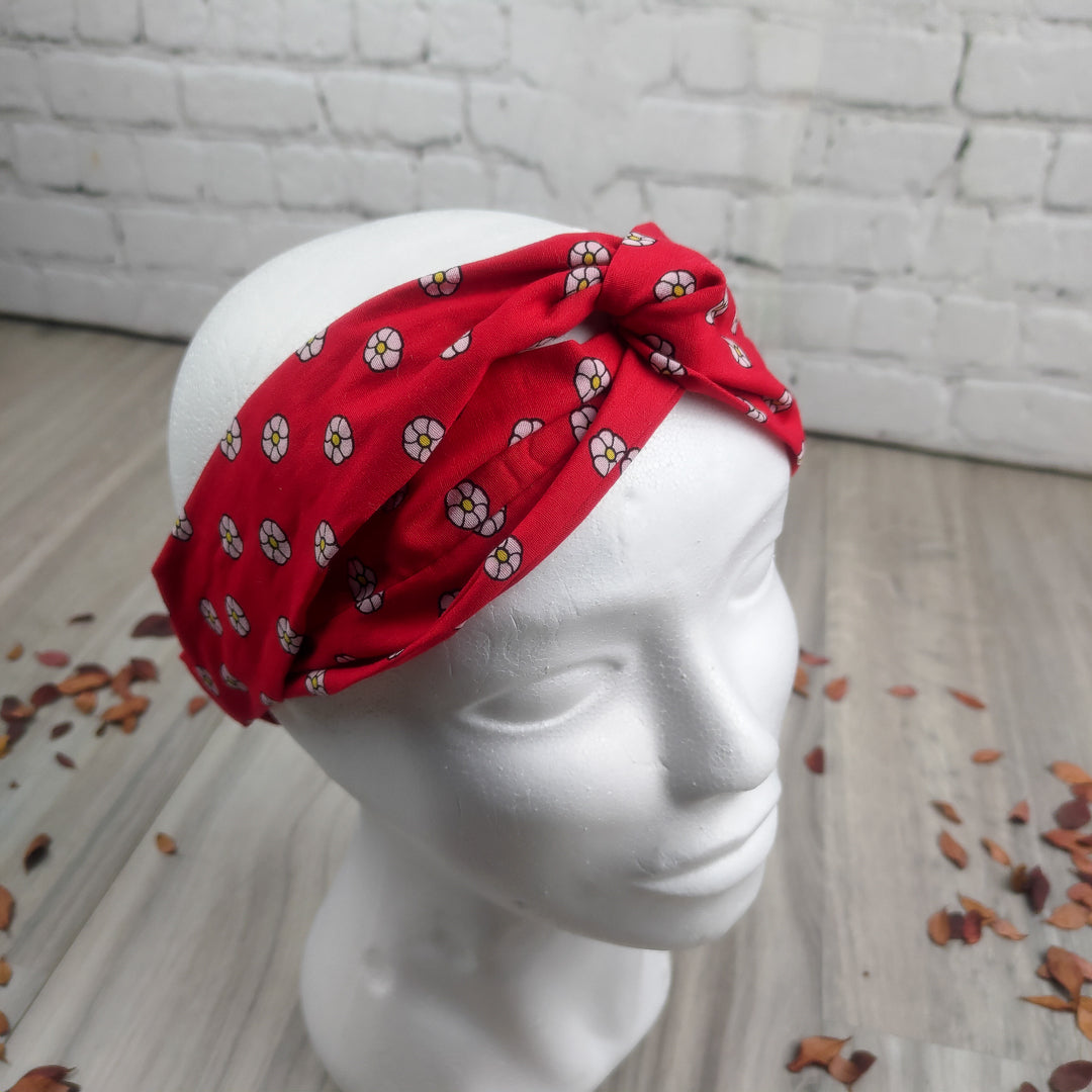 Fascia capelli elastica millefiori rossa con motivo floreale per donne trendy e alla moda