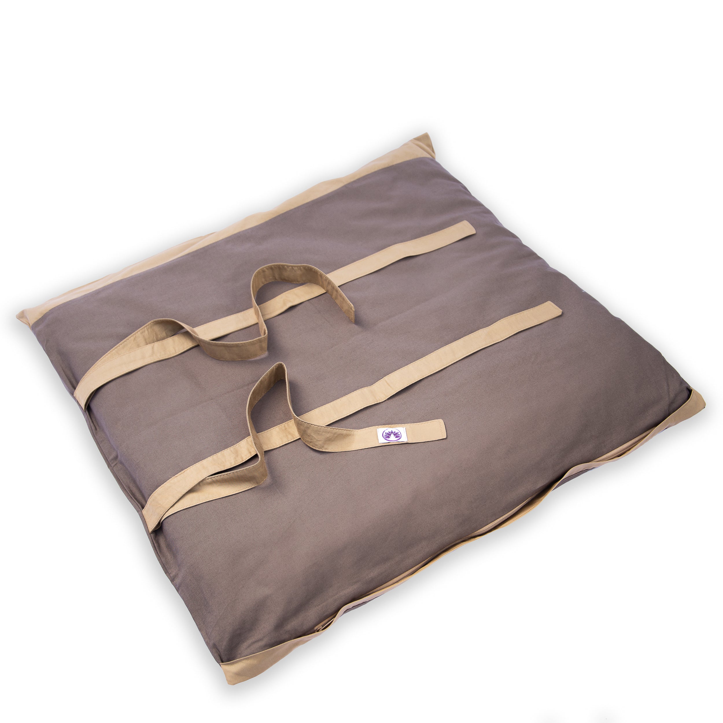 Tappetino zabuton naturale scuro con cinghie regolabili per un supporto confortevole durante la meditazione