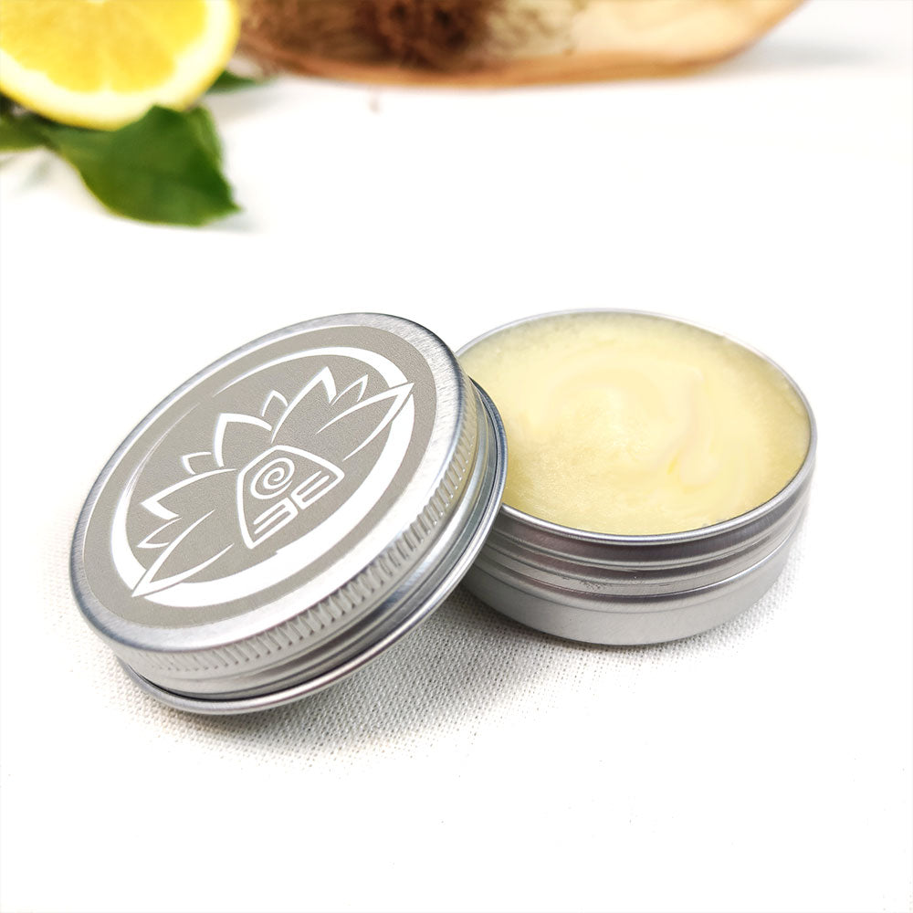 Burro corpo naturale decontratturante in confezione metallica con un profumo fresco di limone e erbe