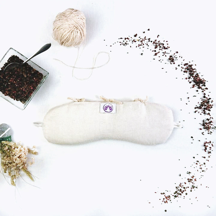 Cuscino defaticante naturale di Shop Zen con erbe terapeutiche e design morbido