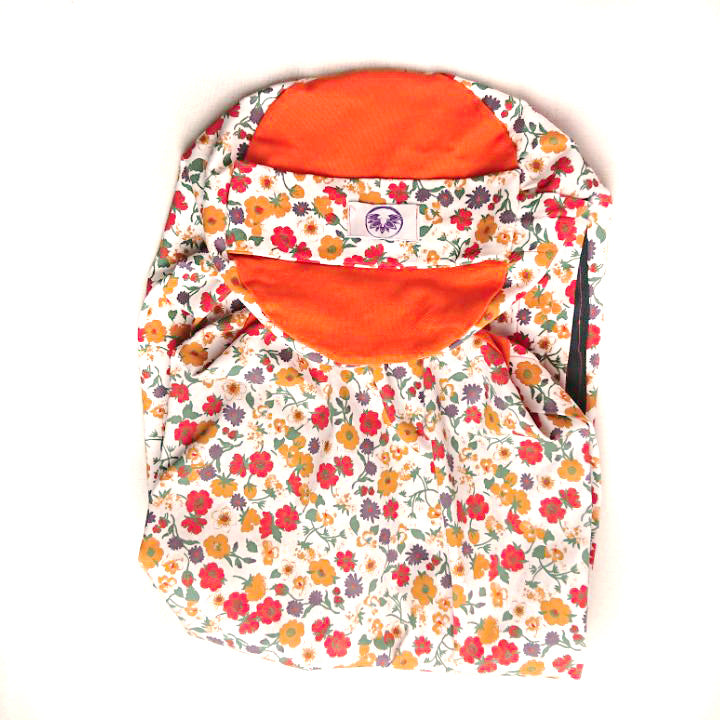 Fodera bolster yoga floreale con dettagli arancioni, ideale per il comfort nelle pratiche yoga