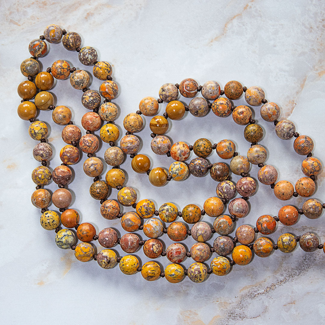 Mala 108 grani "Io sono Gioioso" in Calcite Arancione e Turchese Americano