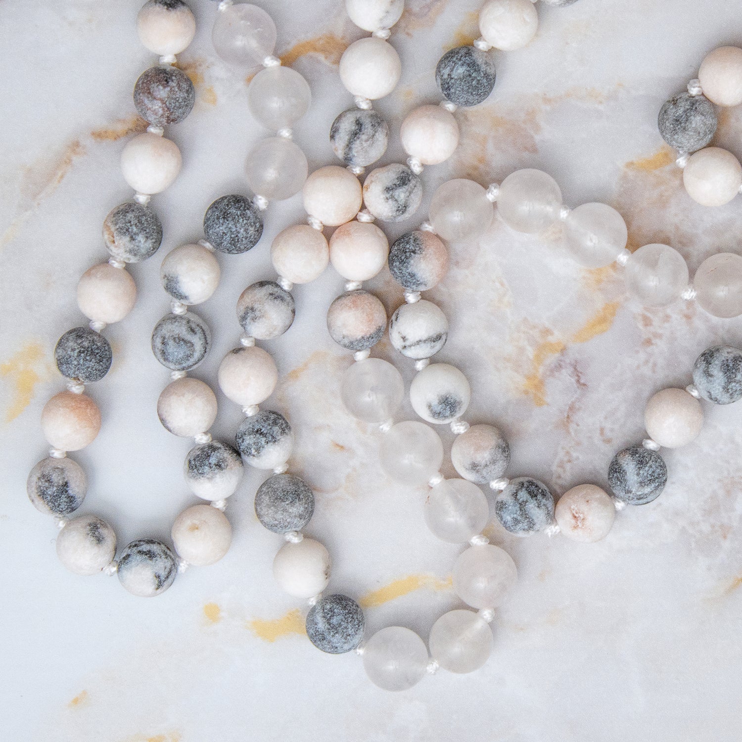 Collana mala quarzo rosa e diaspro con perle di diverse sfumature, ideale per meditazione