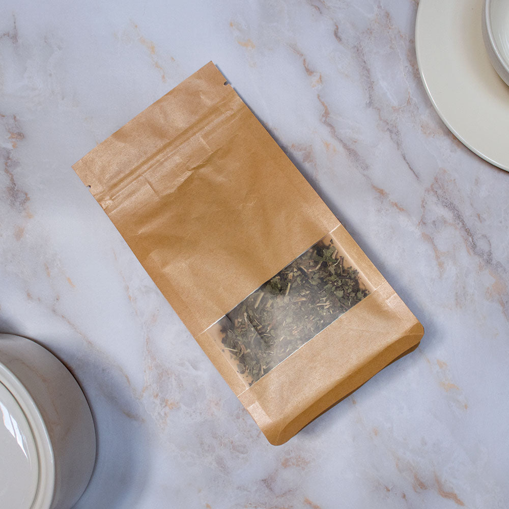 Confezione di tisana primo chakra in sacchetto biodegradabile con finestra trasparente