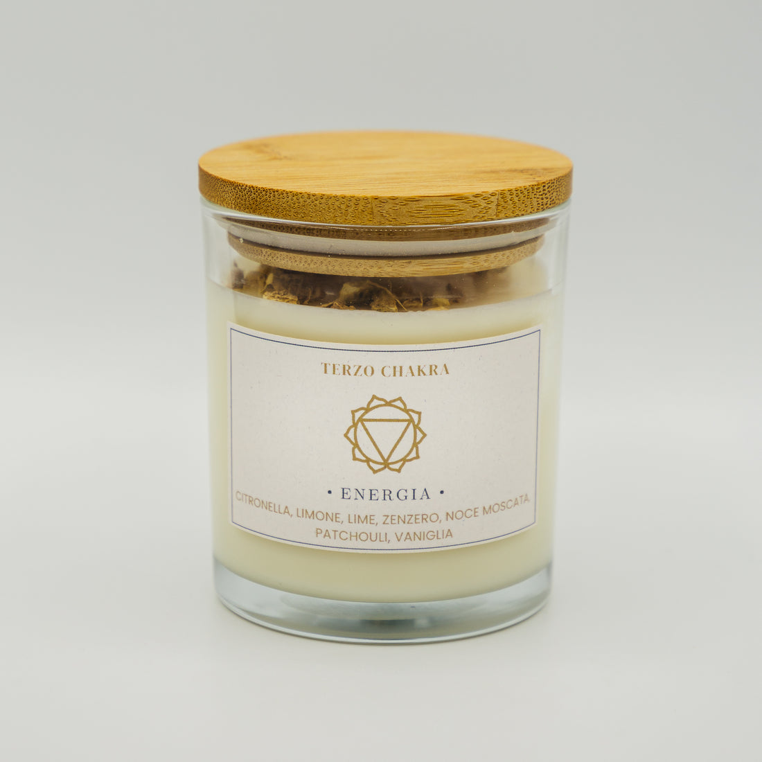 Candela energia terzo chakra in vetro con coperchio in legno, aromi di citronella e patchouli