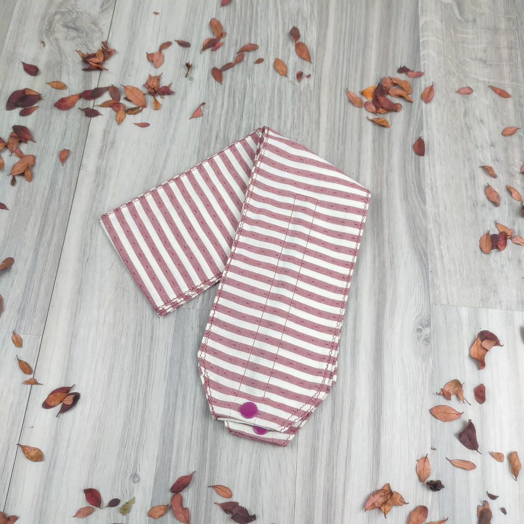 Fascia capelli con ferretto a righe rosa e bianca per un look elegante e casual