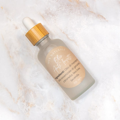 Olio naturale anti insetti in bottiglia di vetro con contagocce per una protezione efficace